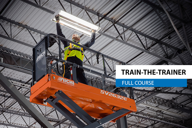 This is a photo showing a man raised on a Scissor Lift and it's in reference to basic fall arrest and scissor lift safety training and "train the trainer" courses that Western Materials Handling has available in Calgary, Edmonton, Grand Prairie, Medicine Hat, Lethbridge and Red Deer